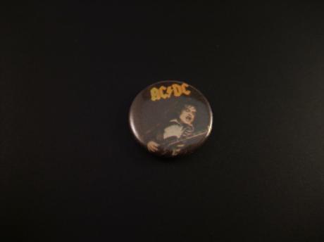 ACDC Australische hardrockband ( gitarist Angus Young)
